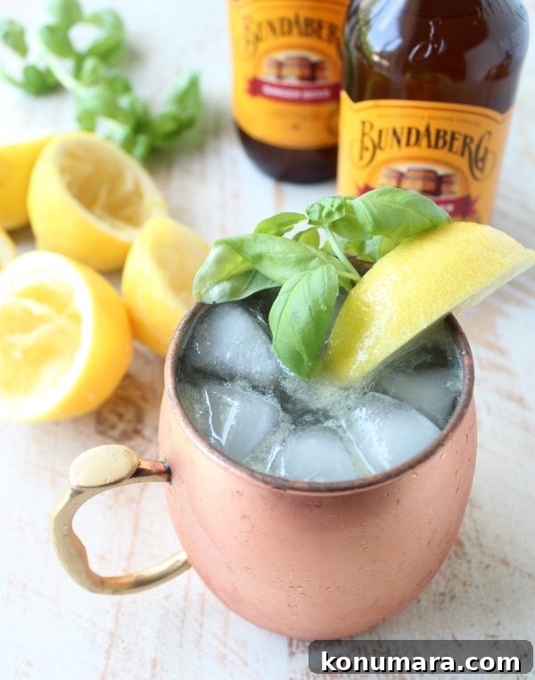 Spiked Ginger Lemonade Cocktail Recipe 8 A pitcher of ginger lemonade with lemons