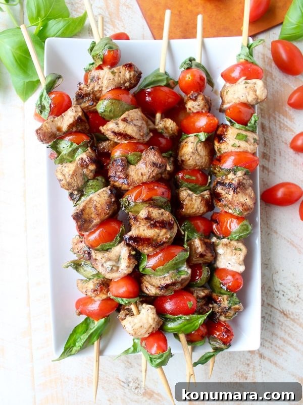 Tomato Basil Chicken Skewers with marinated chicken, cherry tomatoes and fresh basil