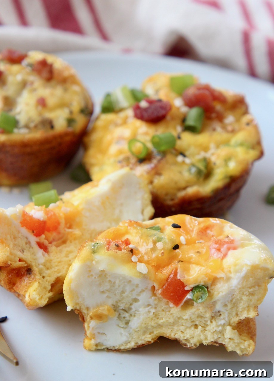 egg muffin cut in half on white plate