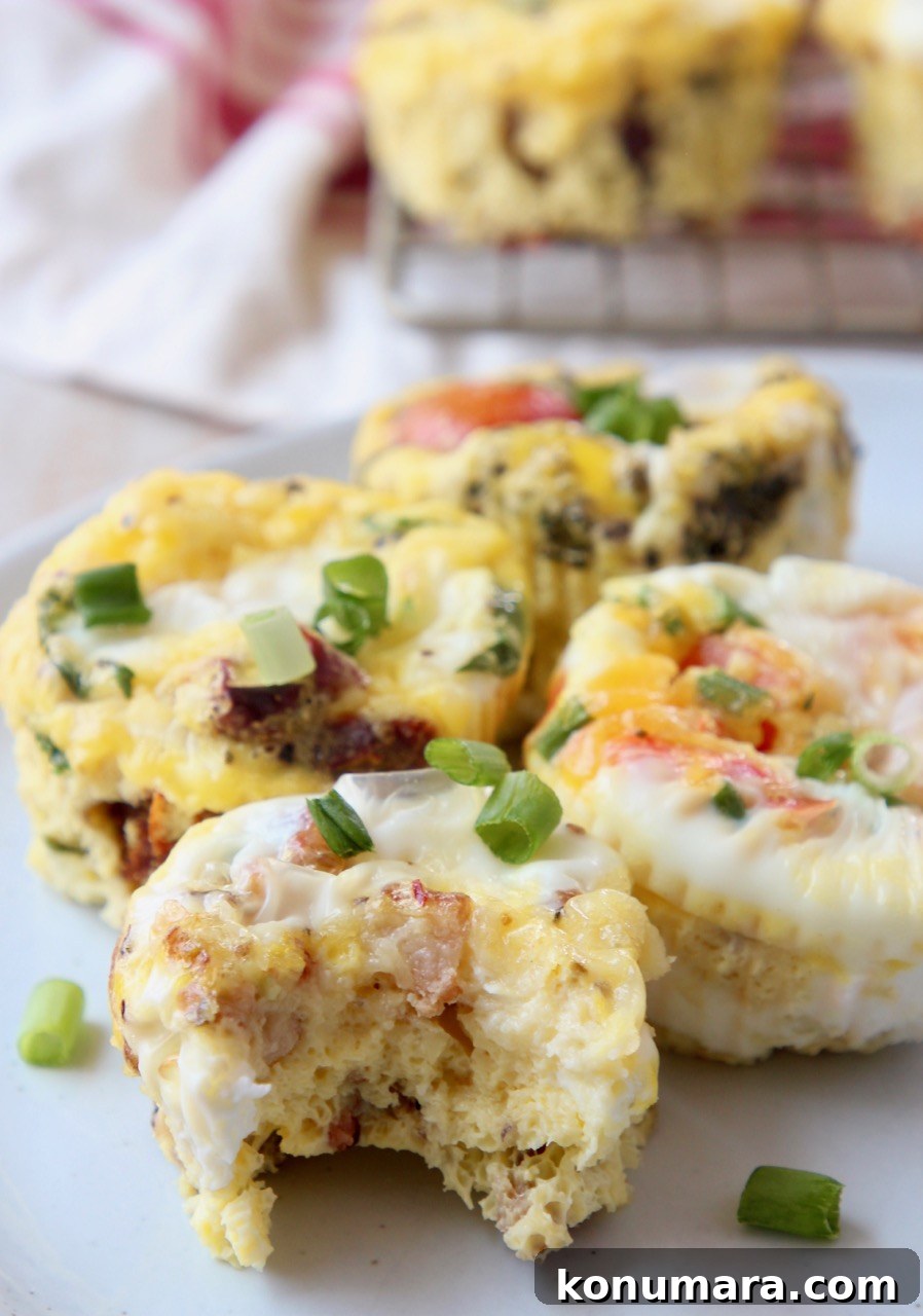 egg muffin on plate with bite taken out of it