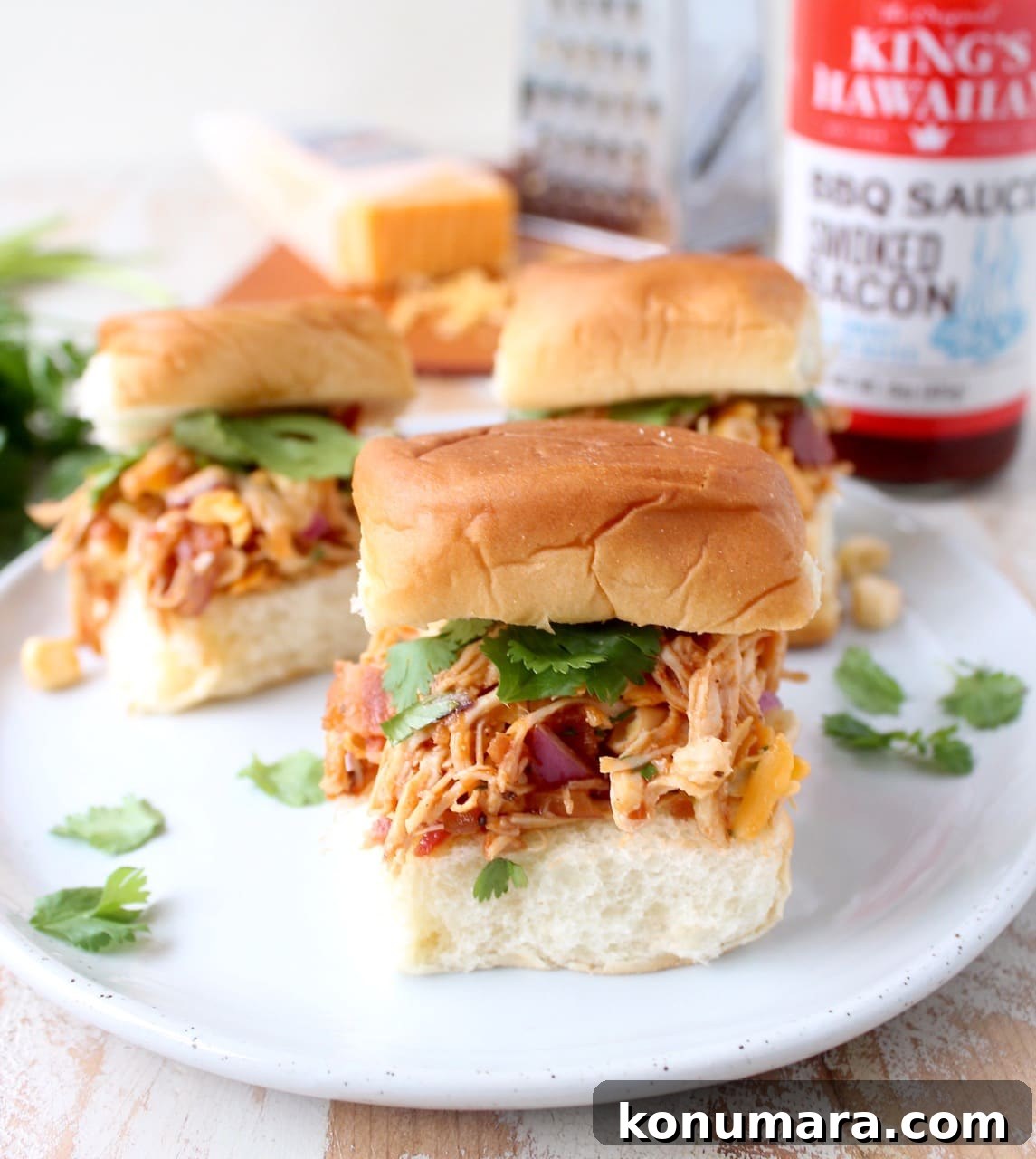 Close-up of BBQ Chicken Salad Sliders with cheddar and bacon