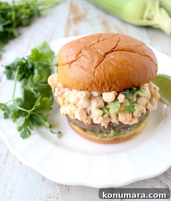 Mexican Street Corn (Elote) Turkey Burgers 5 Mexican turkey burgers are covered in cotija cheese, guacamole and grilled Mexican street corn for a flavorful summer burger recipe!
