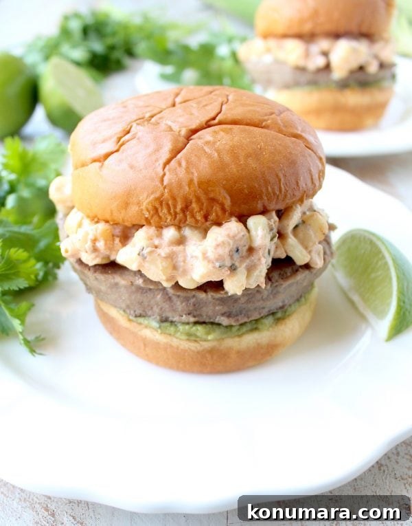 Mexican Street Corn (Elote) Turkey Burgers 6 Mexican turkey burgers are covered in cotija cheese, guacamole and grilled Mexican street corn for a flavorful summer burger recipe!
