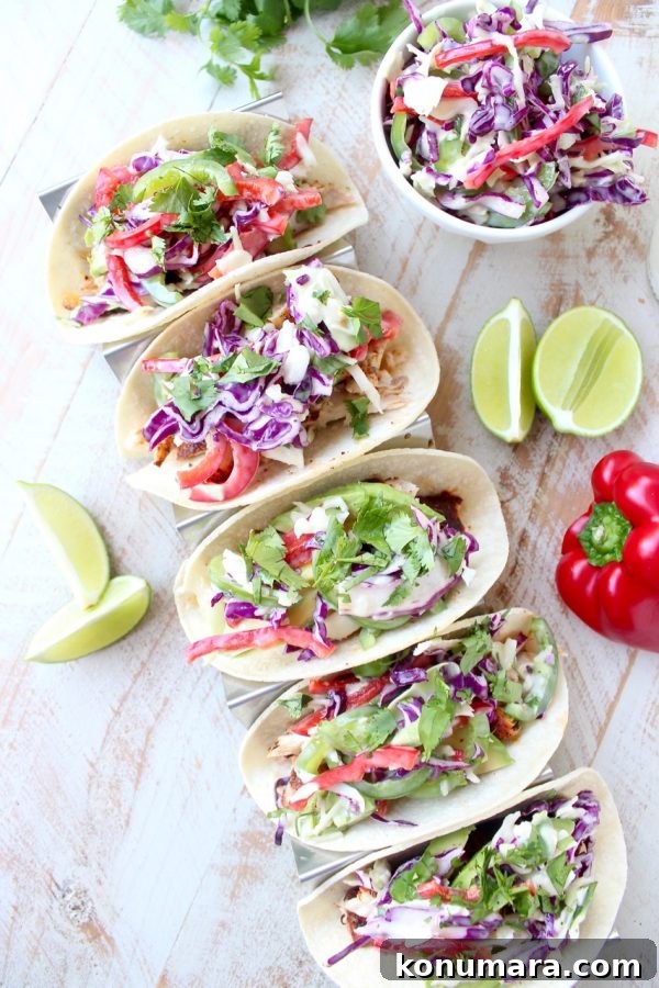 Blackened Mahi Mahi Tacos with Cilantro Jalapeno Slaw 9 Tacos plated with lime and avocado