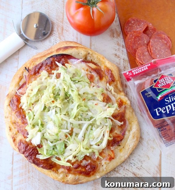 Italian Sub Pizza Recipe: Loaded Meats, Provolone and Herbs 2 All of the ingredients in a traditional Italian Sub, like salami, pepperoni & provolone, top this delicious Italian Sub Pizza Recipe, easily made in under 30 minutes in the oven or on the grill!