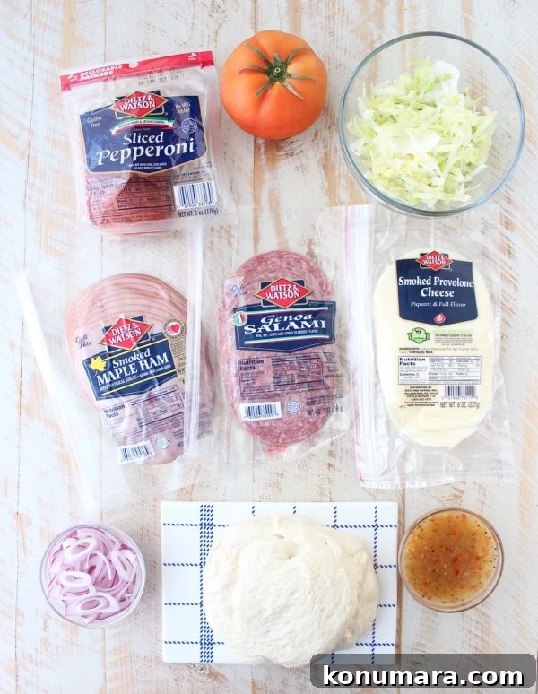 Italian Sub Pizza Recipe: Loaded Meats, Provolone and Herbs 4 All of the ingredients in a traditional Italian Sub, like salami, pepperoni & provolone, top this delicious Italian Sub Pizza Recipe, easily made in under 30 minutes in the oven or on the grill!