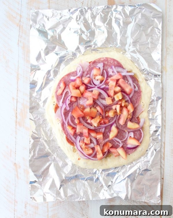 Italian Sub Pizza Recipe: Loaded Meats, Provolone and Herbs 5 All of the ingredients in a traditional Italian Sub, like salami, pepperoni & provolone, top this delicious Italian Sub Pizza Recipe, easily made in under 30 minutes in the oven or on the grill!