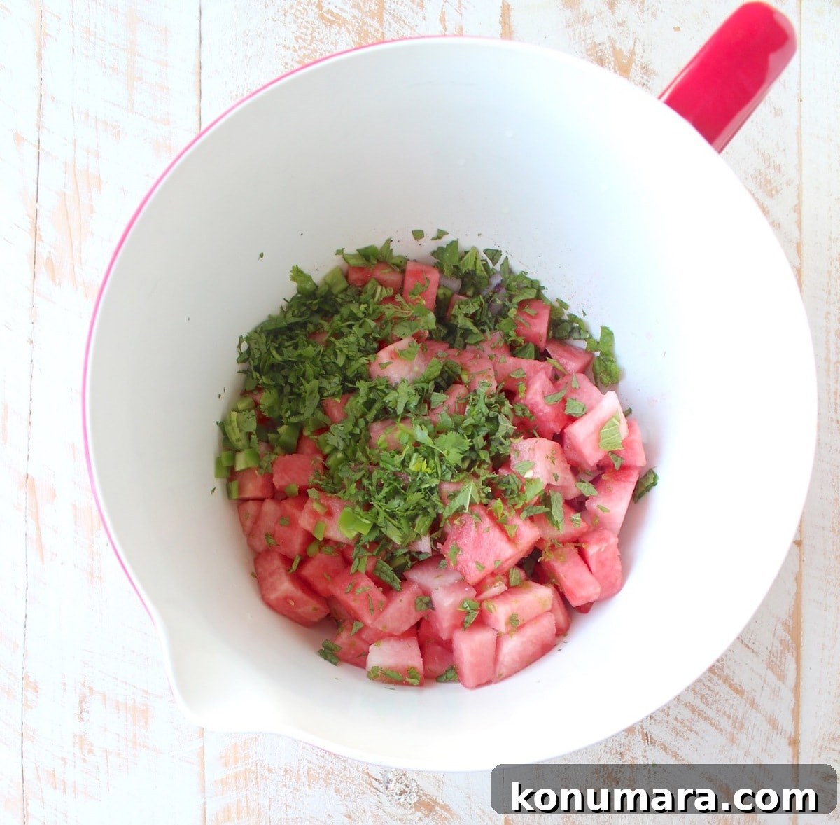 Watermelon salsa ingredients in large mixing bowl
