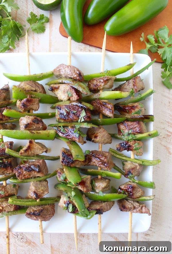 These Steak Kabobs are marinated in a delicious honey lime jalapeno marinade then skewered with fresh jalapenos & tossed on the grill for a delicious meal!
