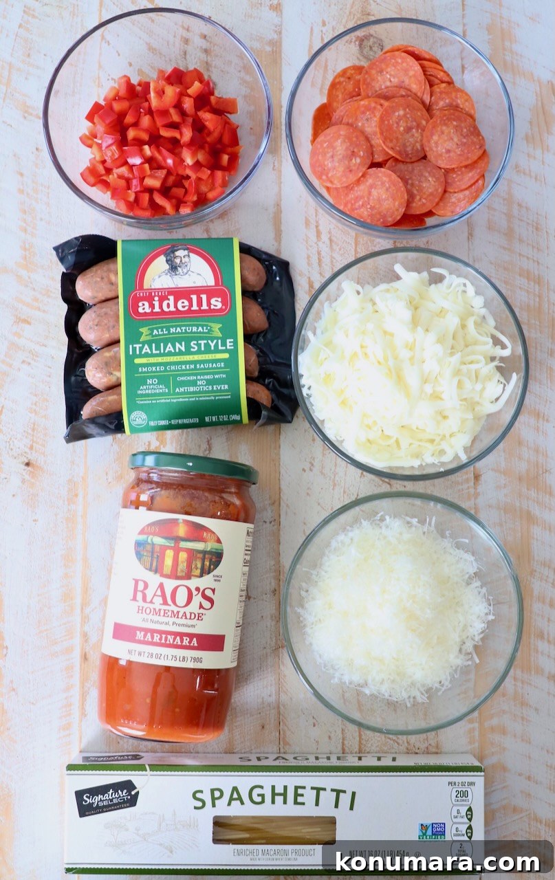 Baked Spaghetti Pizza Recipe 3 ingredients for pizza baked spaghetti on white wood board