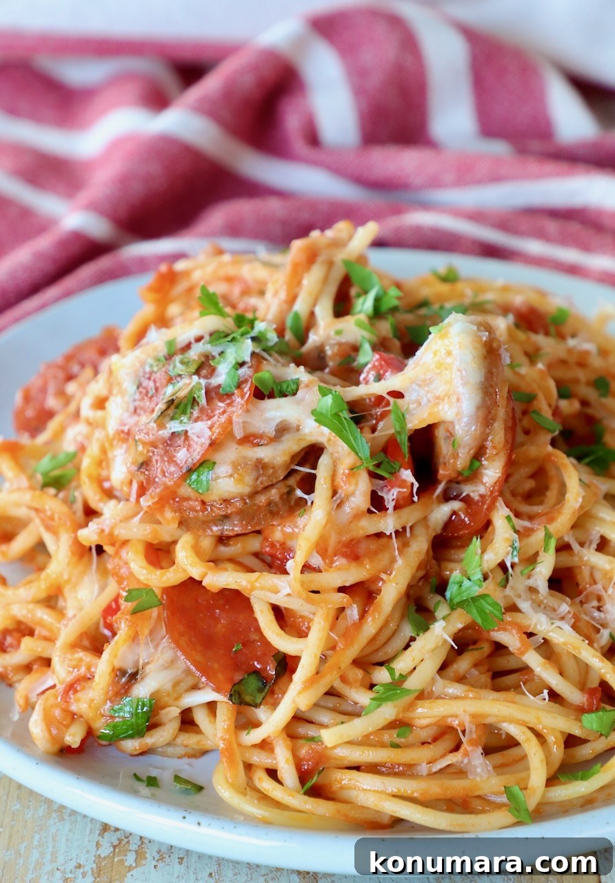 Baked Spaghetti Pizza Recipe 9 pizza baked spaghetti served on plate