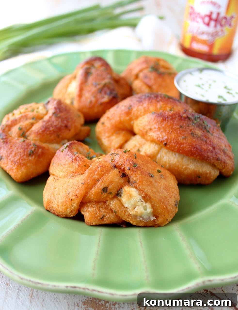Spicy Buffalo Cheesy Garlic Knots Recipe 7 Close-up of a cheesy garlic knot