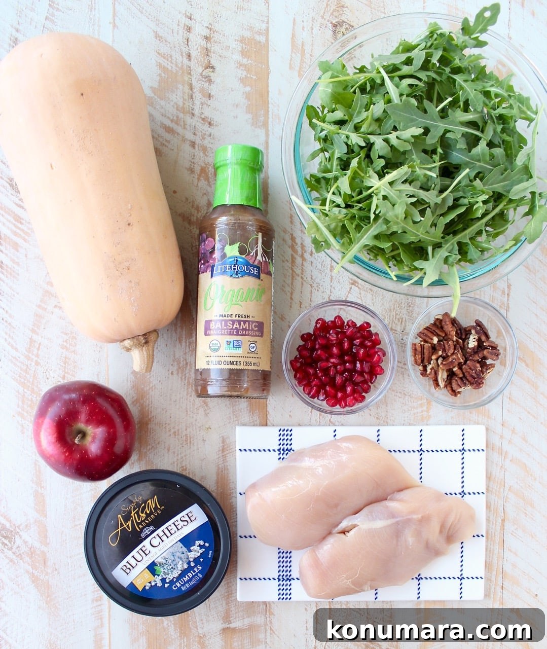 ingredients for balsamic chicken and butternut squash noodles bowls on a white wood board