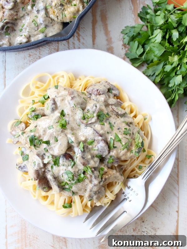 Creamy Mushroom Chicken Parmesan Recipe 7 Plate of creamy mushroom chicken parmesan with pasta