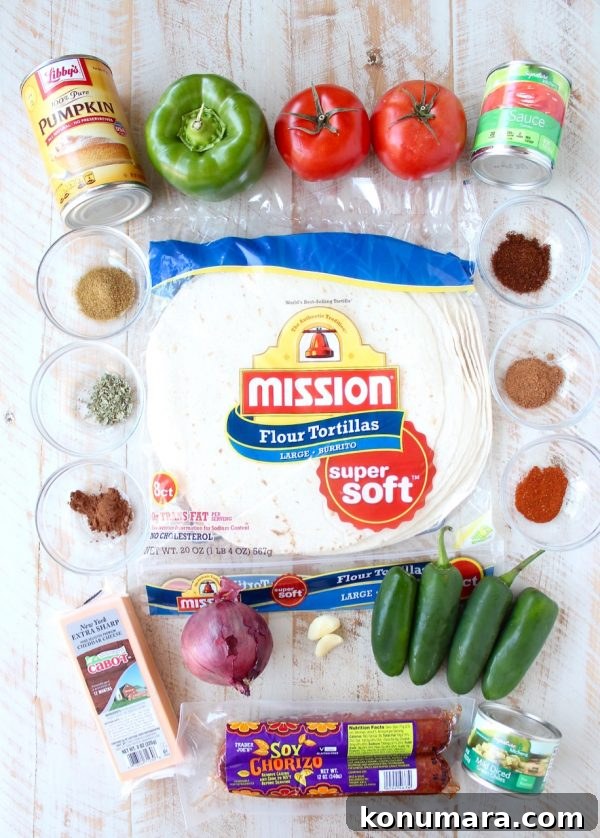 Serving of pumpkin enchiladas with avocado and sour cream