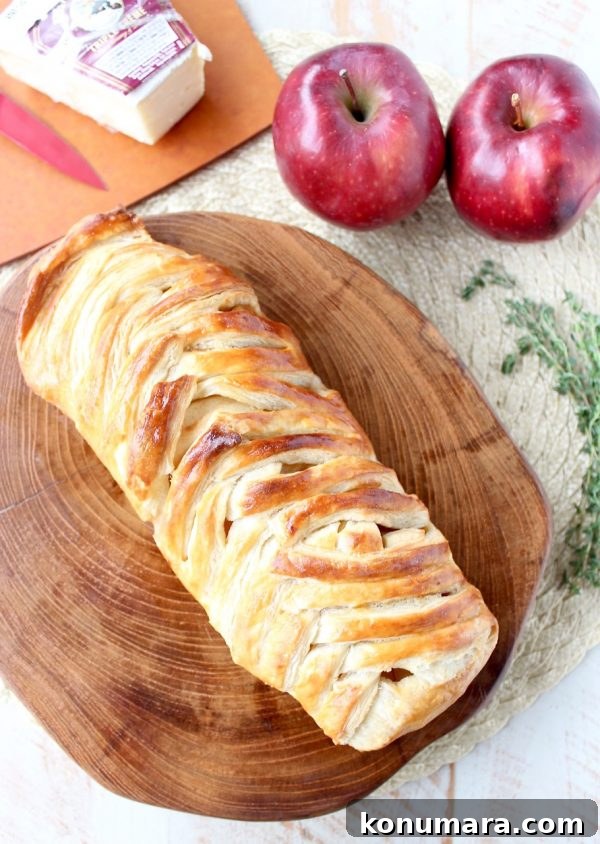 Brie-Stuffed Apple Strudel Recipe 3 Braided puff pastry apple strudel with brie.