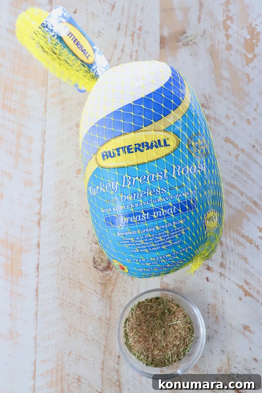 Juicy Sous-Vide Turkey Breast Recipe 3 boneless turkey breast in packaging next to a bowl of turkey seasoning