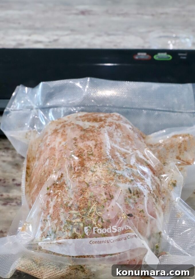 Juicy Sous-Vide Turkey Breast Recipe 4 vacuum sealed turkey breast with seasonings in a bag