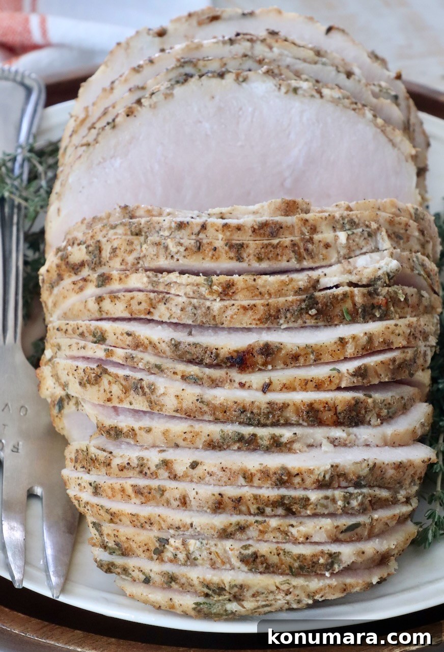 Juicy Sous-Vide Turkey Breast Recipe 7 sliced turkey breast on a plate