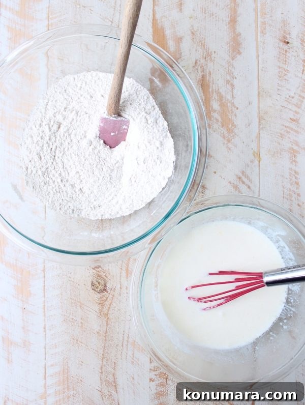 Stuffed Biscuits Recipe: Savory Filling Ideas 5 a glass bowl of flour sitting next to a glass bowl of milk with a whisk in it