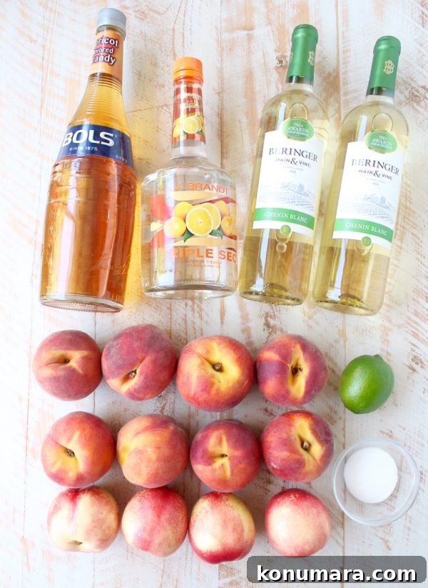 This white peach sangria is the perfect summer cocktail recipe combining refreshing white wine with fresh peaches, nectarines and lime juice!