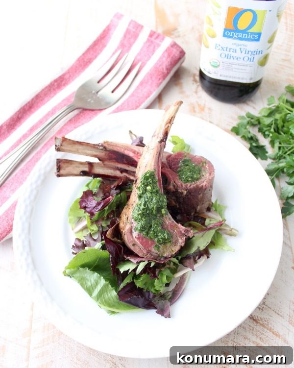 Roasted Rack of Lamb Recipe with Herb Butter and Mint Chimichurri 3 Rack of lamb is rubbed with herb butter, then roasted and topped with a mint chimichurri sauce in this elegant dinner recipe!