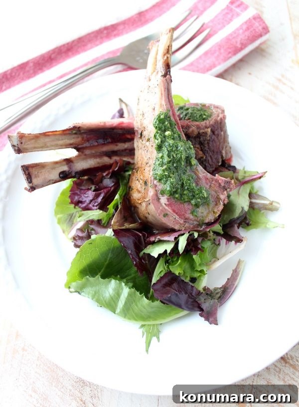 Roasted Rack of Lamb Recipe with Herb Butter and Mint Chimichurri 5 Rack of lamb is rubbed with herb butter, then roasted and topped with a mint chimichurri sauce in this elegant dinner recipe!