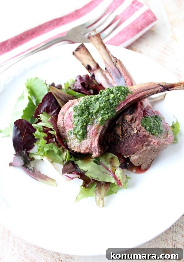 Roasted Rack of Lamb Recipe with Herb Butter and Mint Chimichurri 6 Rack of lamb is rubbed with herb butter, then roasted and topped with a mint chimichurri sauce in this elegant dinner recipe!