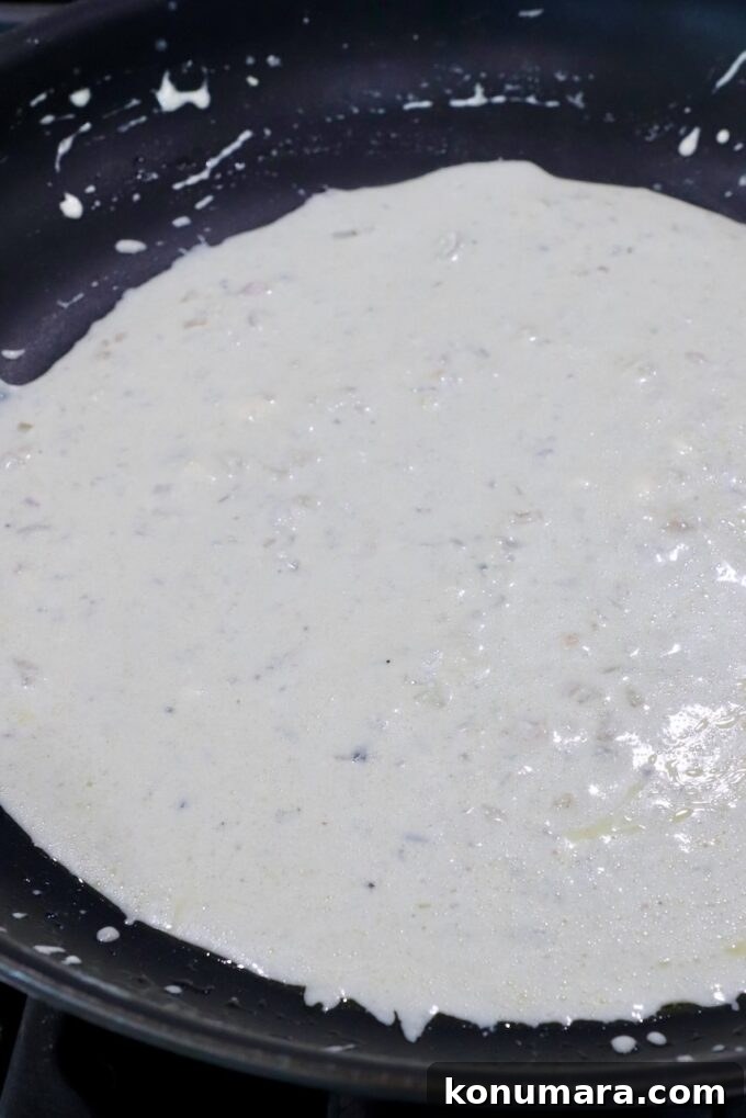 gorgonzola cream sauce in a skillet