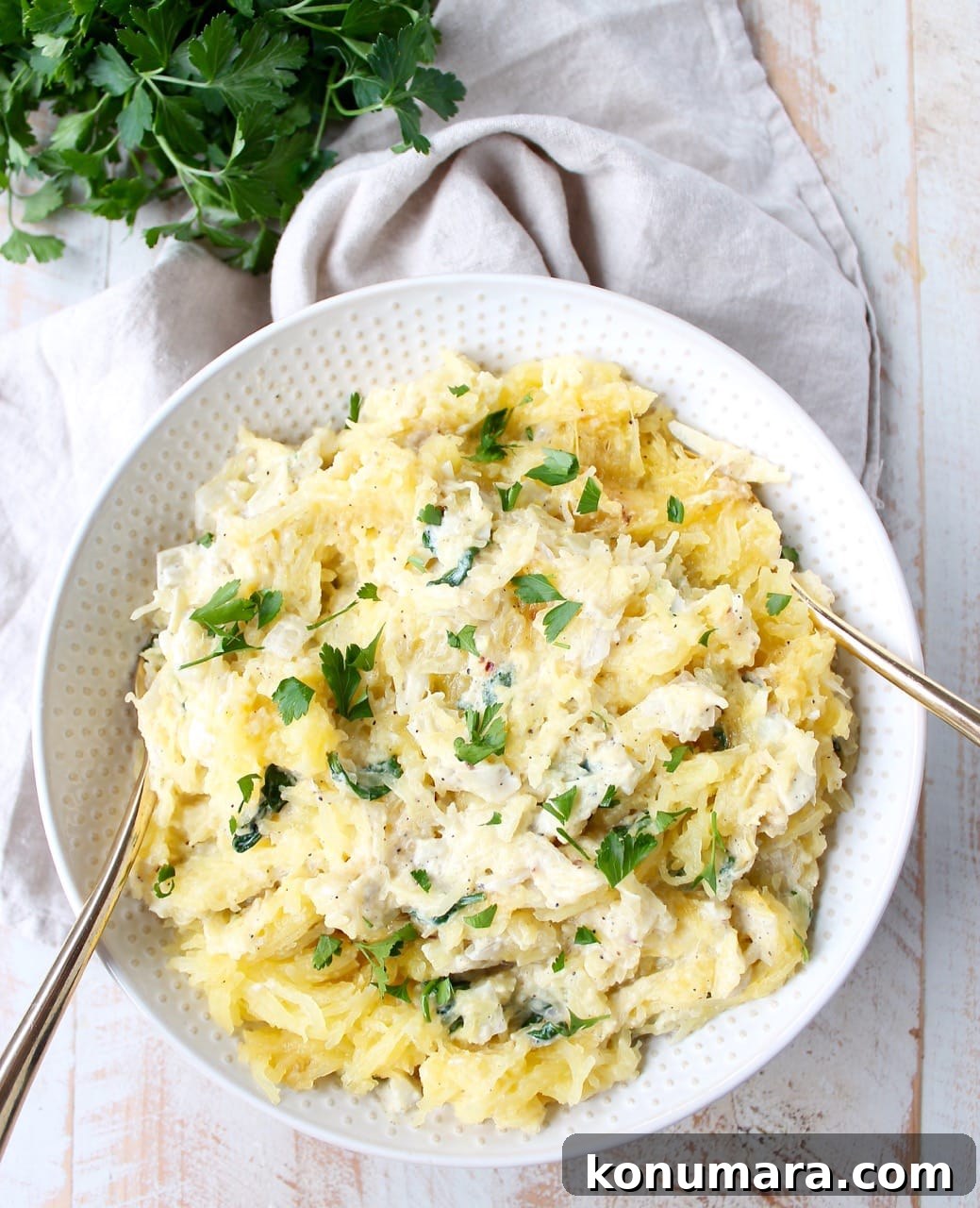 Spinach and Artichoke Spaghetti Squash Bake 2 Baked spaghetti squash tossed with a creamy spinach artichoke sauce