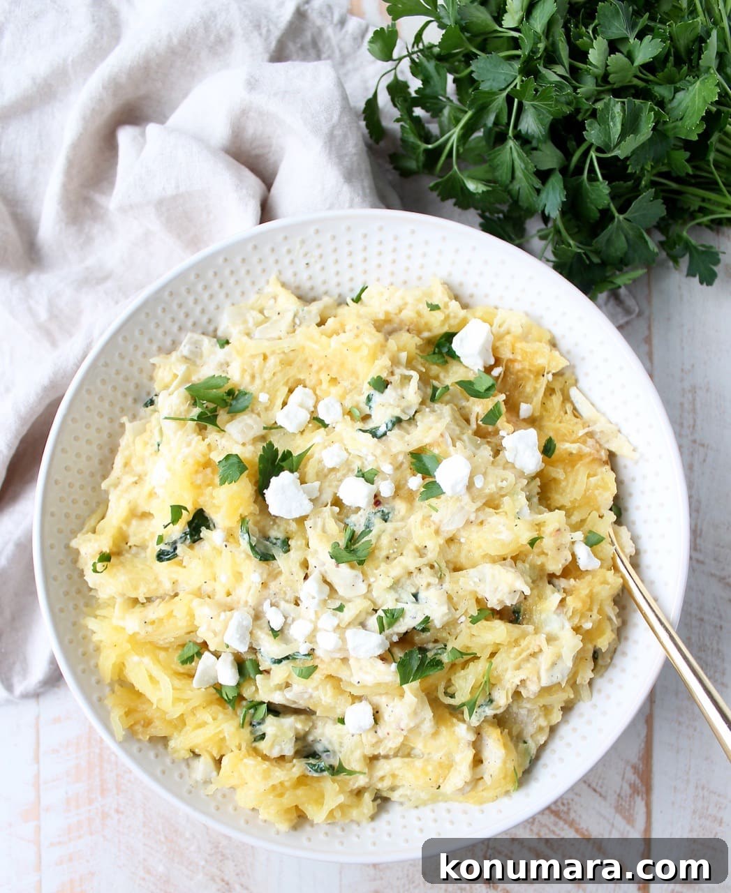 Spinach and Artichoke Spaghetti Squash Bake 4 Spinach artichoke spaghetti squash served on a plate