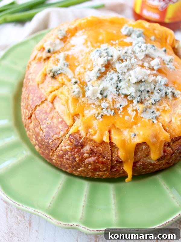 Buffalo Chicken Dip Bread Bowl served at a party