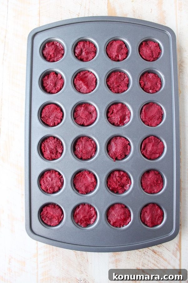 Red velvet cookie cups filled with cream cheese frosting are a delicious and adorable dessert recipe that's also easy to make! Perfect for Valentine's Day, birthdays or any day you're craving a sweet treat!