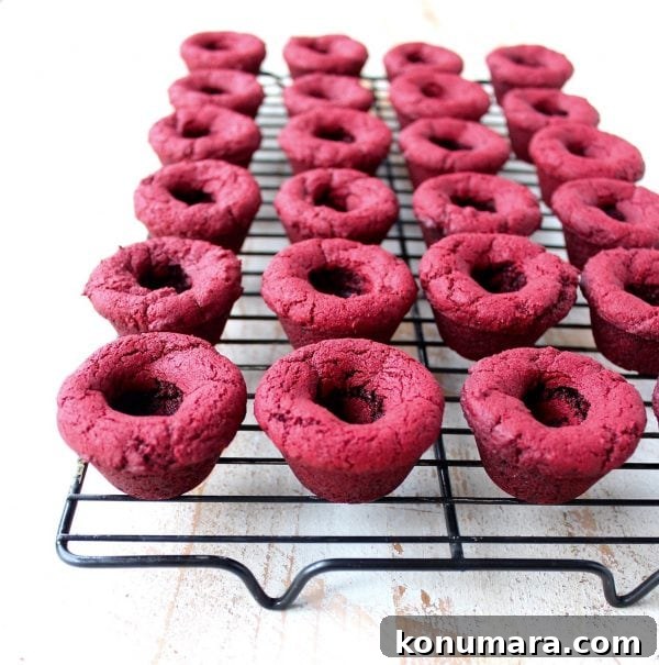 Red velvet cookie cups filled with cream cheese frosting are a delicious and adorable dessert recipe that's also easy to make! Perfect for Valentine's Day, birthdays or any day you're craving a sweet treat!