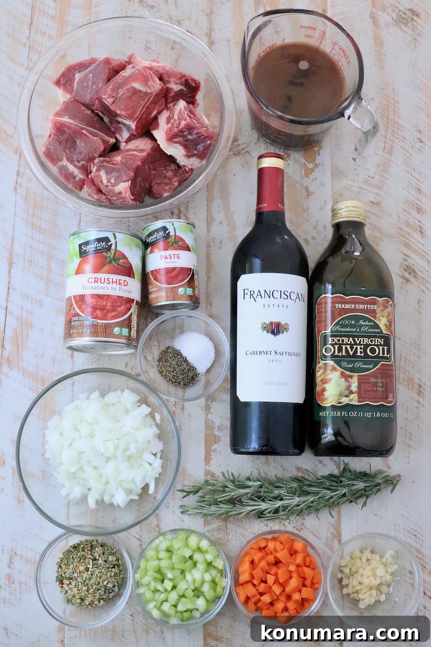 Instant Pot Beef Ragu with Tomato and Red Wine 3 ingredients for beef ragu on a white wood board