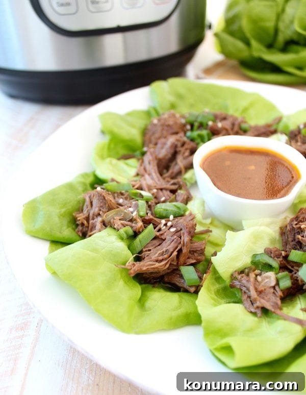 Whole30 Thai Beef is easy to make in the Instant Pot in under an hour. Shred the beef and serve it in lettuce wraps for a Whole30 meal or serve it in corn tortillas for a gluten free Thai twist on Taco Tuesday!