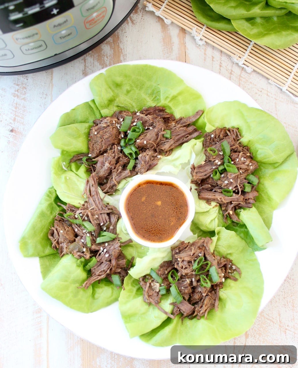Whole30 Thai Beef is easy to make in the Instant Pot in under an hour. Shred the beef and serve it in lettuce wraps for a Whole30 meal or serve it in corn tortillas for a gluten free Thai twist on Taco Tuesday!