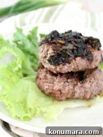 Whole30 Hamburgers are healthy, packed with protein, and gluten free, they're wrapped in lettuce and topped with a sesame scallion sauce for a flavorful meal!