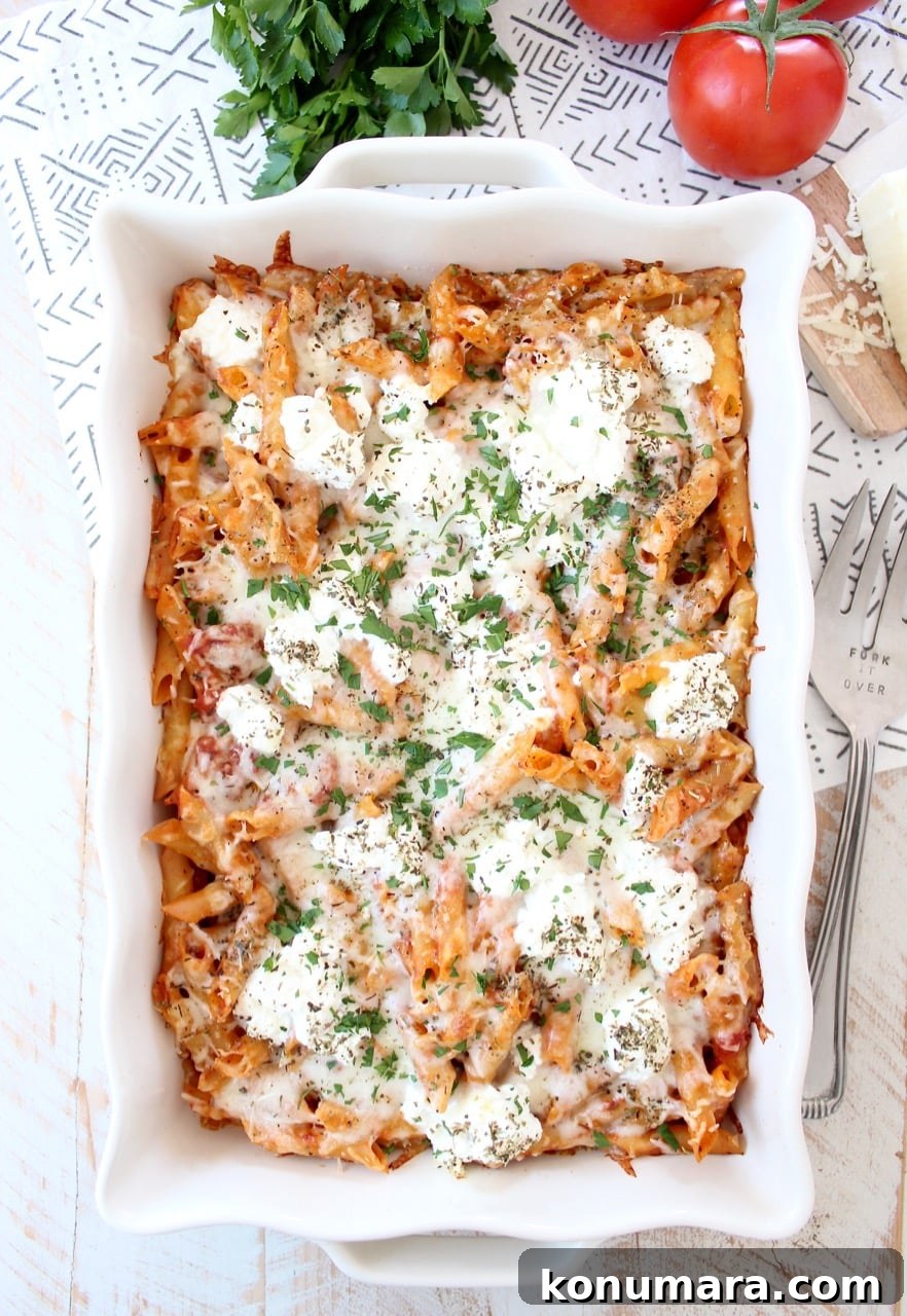 baked pasta in casserole dish topped with cheese