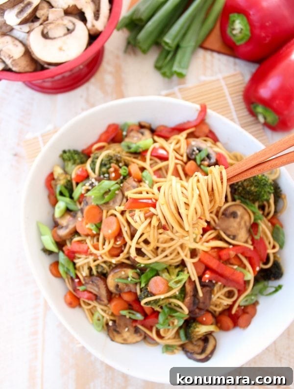 Lo mein noodles and fresh veggies are tossed with a homemade General Tso sauce in this easy Vegetarian General Tso Stir Fry recipe, made in just 25 minutes! Vegetables and Noodles with General Tso Sauce