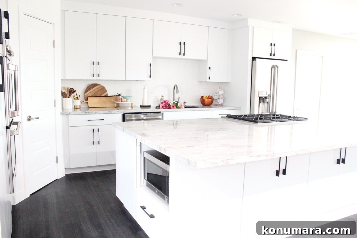 White Kitchen with New River White Granite Countertops and Large 12 foot island