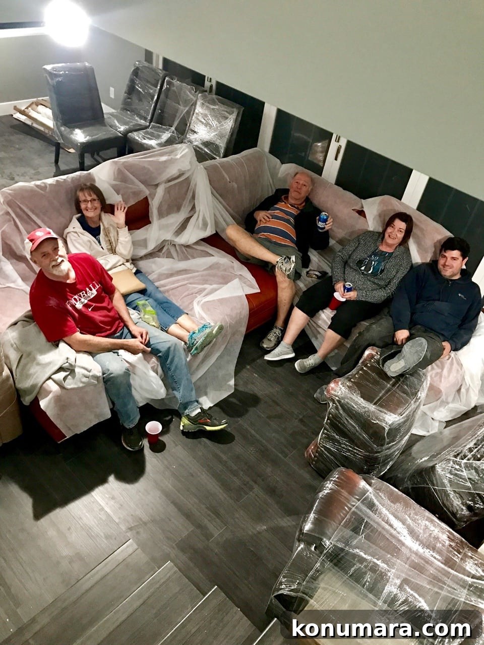 Family on couch after moving