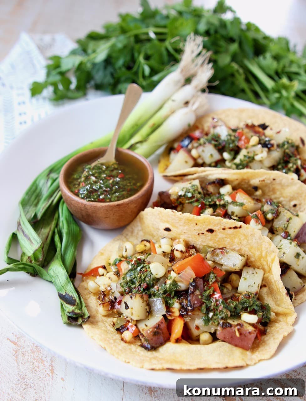 Vegan Grilled Veggie Tacos with Chimichurri 6 Vegan Tacos filled with Grilled Corn, Potatoes and Peppers