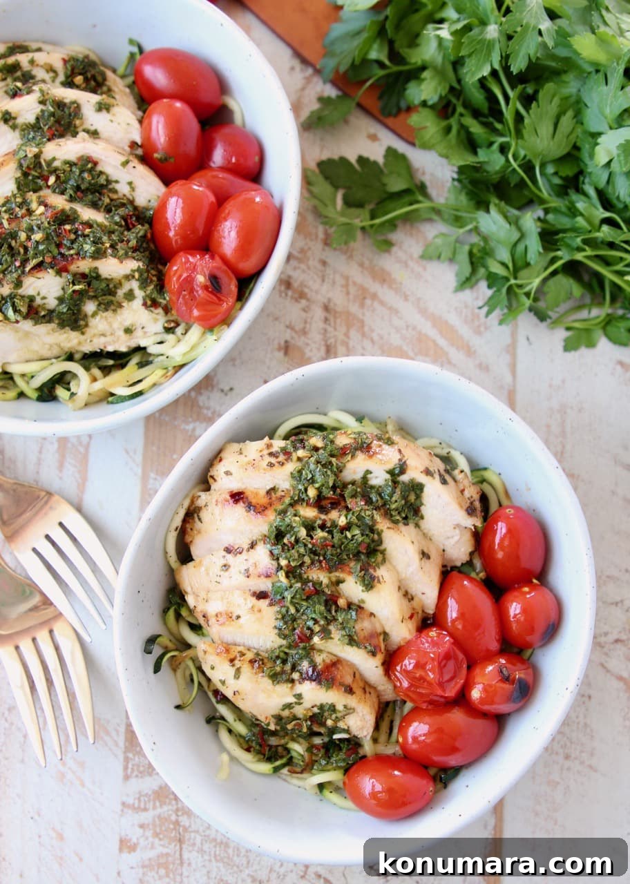 Sliced Grilled Chimichurri Chicken with Zucchini Noodles, Cherry Tomatoes and Fresh Parsley