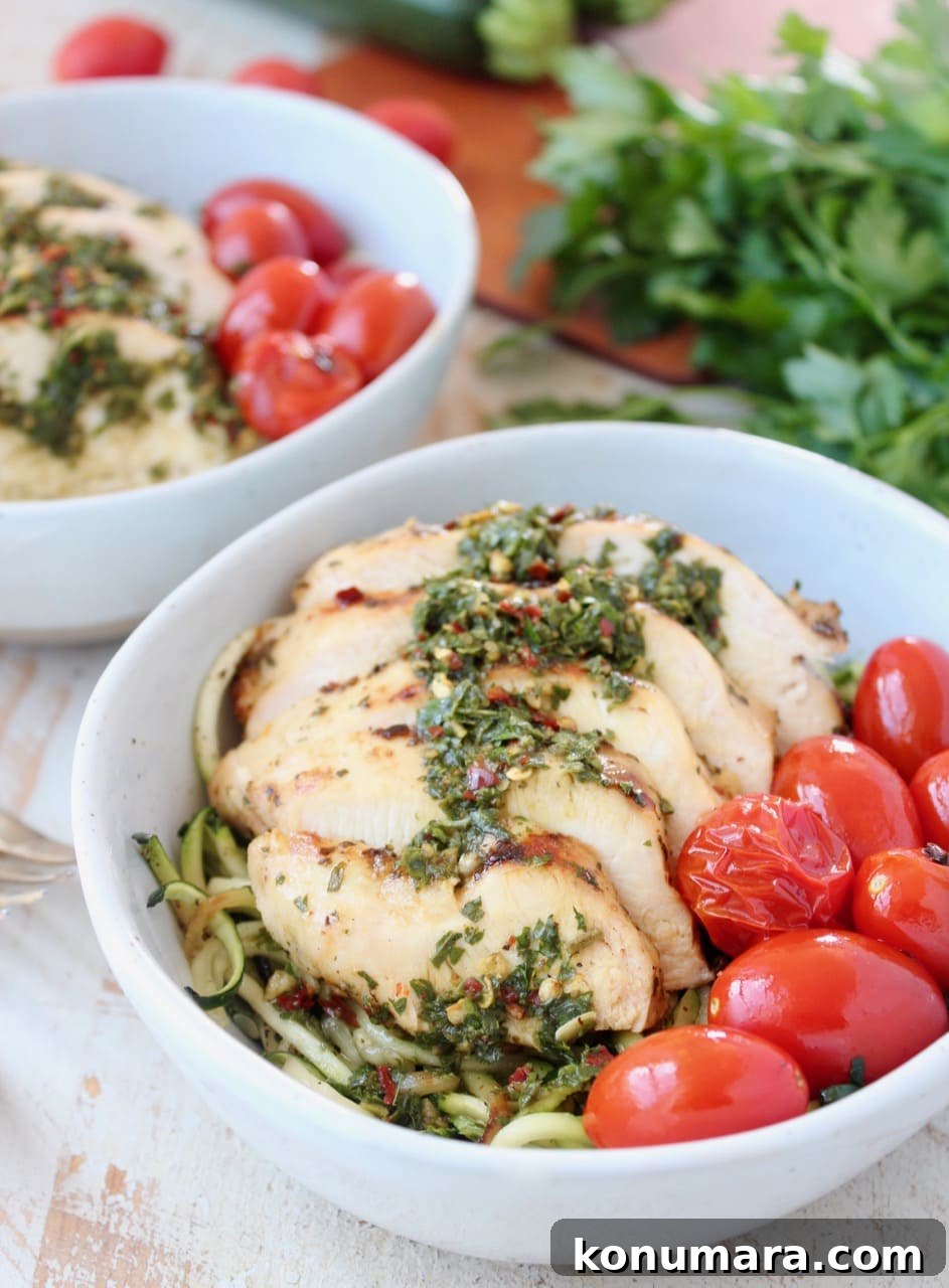 Sliced Chimichurri Chicken with Chimichurri Sauce, Zucchini Noodles and Cherry Tomatoes