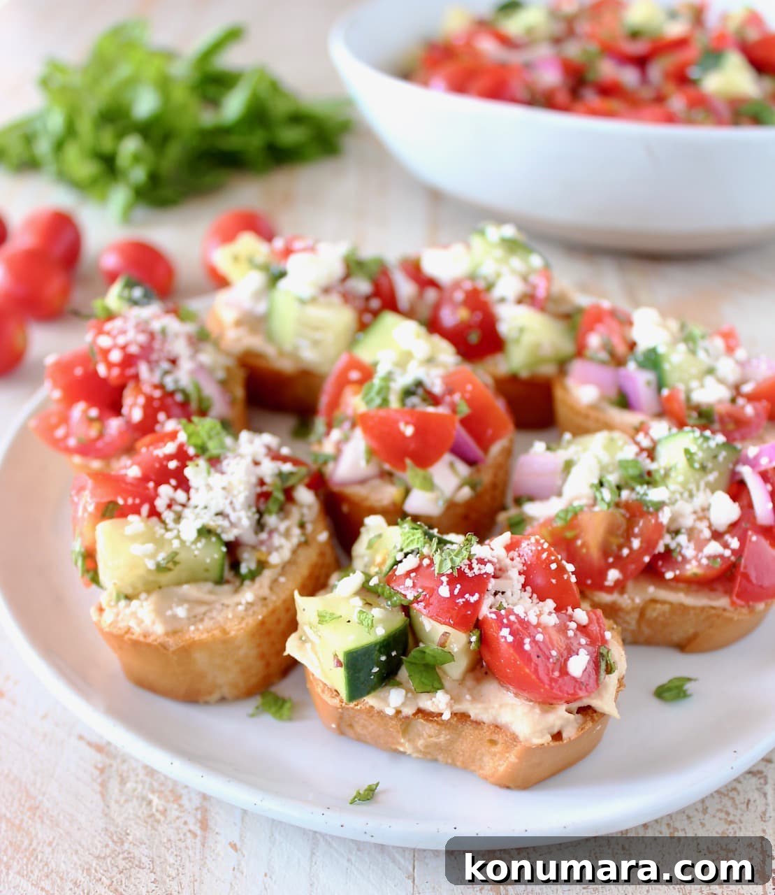 Greek Bruschetta with Feta, Tomato and Olive Tapenade 4 Cherry Tomato Cucumber Feta Greek Bruschetta Recipe on a Toasted Baguette