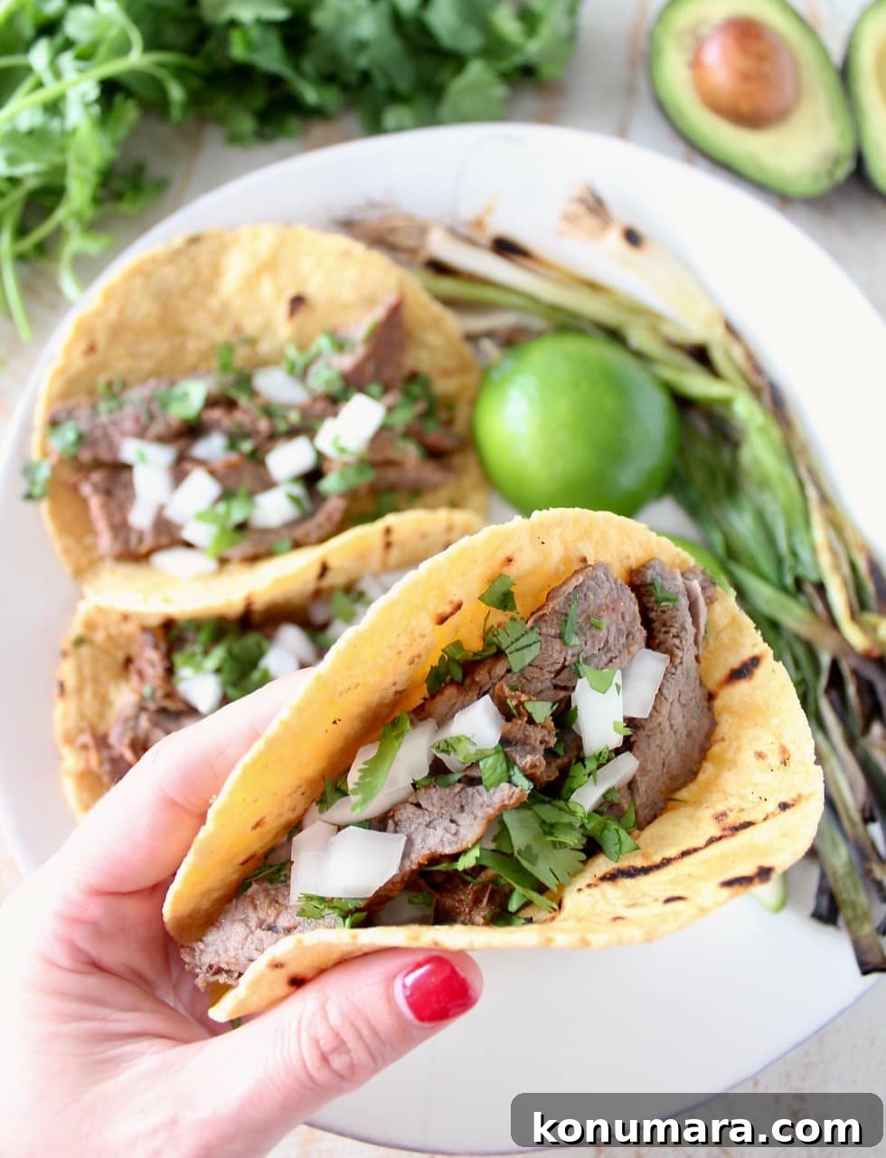 Carne Asada Tacos with Onions, Cilantro and Grilled Green Onions