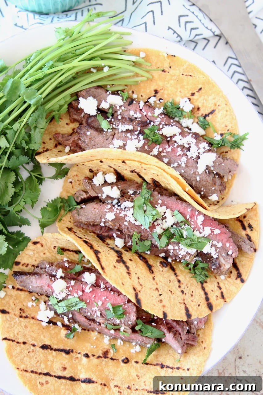 Cajun Steak Tacos Recipe 6 Cajun Steak Tacos with Grilled Corn Tortillas, Cotija Cheese and Fresh Cilantro