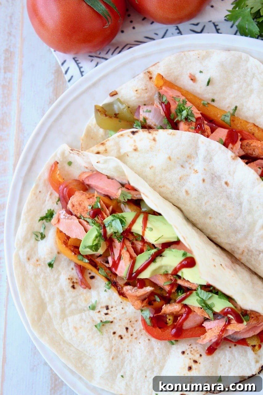 Salmon Fajitas in Flour Tortillas with Avocado and Hot Sauce
