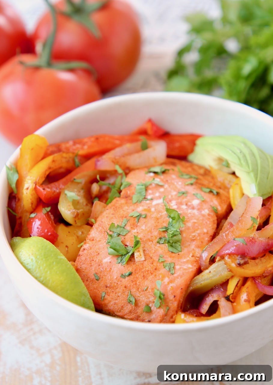 Salmon Fajita Rice Bowl with Sliced Avocado and Bell Peppers